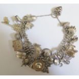 A Silver Charm Bracelet, 97.6g