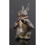 An Antique Cold Painted Bronze of a Beatrix Potter Rabbit with a jacket and basket, 4cm