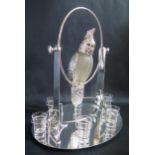 An Electroplated Silver and Glass Novelty Cockatoo Shot Server with six glasses,