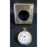 A George V Silver Goliath Pocket Watch Easel Back Case, London 1915, William Comyns & Sons and 8 Day