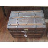 A Small Wood and Metal Bound Canvas Dome Top trunk and contents including collector's plates, 38cm