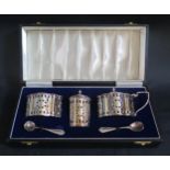 An Elizabeth II Cased Silver and Pierced Three Part Cruet Set with matching spoons, London 1968,