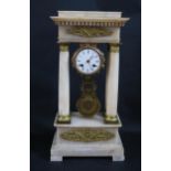 A 19th Century French Empire Alabaster and Ormolu Mantle Clock by Le Roy et fils, the pendulum