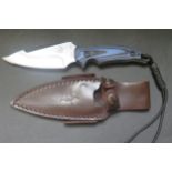 A Lightfoot PE558 Knife in leather sheath