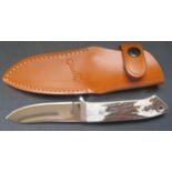 An Olivetto Sports 493 Knife with stag horn handle and leather sheath, receipt, new old shop stock