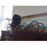 A Victorian Style Model Pram (c.58cm long) and one other carriage