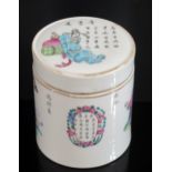 A Chinese Famille Rose Porcelain Cylindrical Box with Cover decorated with figures and script, 11.