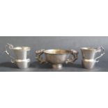 A Pair of Continental White Metal Cups (5cm high) and small loving cup, 65g