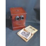 A Victorian Stereoscope with revolving display of cards and glass slides and box of cards