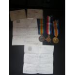 A Boxed WWI Three Medal Group with 1914-15 Star awarded 10861 PTE. W. KNAPMAN. DEVON.R. and with