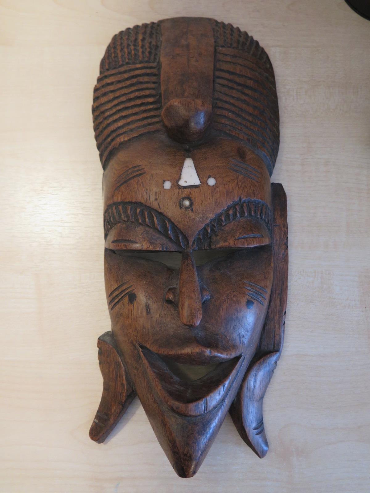 An African Carved Hardwood and Bone Inlaid Mask, 37cm