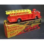 A Marx (U.S.A.) Mechanical Deluxe Fire Truck in Original Box. Model is excellent, box is complete