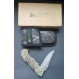 A Columbia River Cascade CRKT Camo Folding Knife, belt clip and case, (new old shop stock)