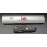 A Heckler & Koch HK 50th Anniversary Special Edition Folding Knife in tin case