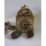 A Small English Brass Travel Wall Clock, the silvered chapter ring with brass spandrels, signed R