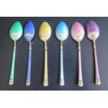 A George V Set of Six Silver Gilt and Multi Coloured Enamel Coffee Spoons, Birmingham 1930, Turner &