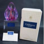 A Caithness Glass Paperweight Turkish Delight 23/50, boxed with COA and stand