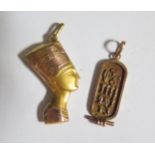 An Egyptian Gold Hieroglyphic Pendant (37mm drop) and ancient Egyptian bust pendant, 5.5g