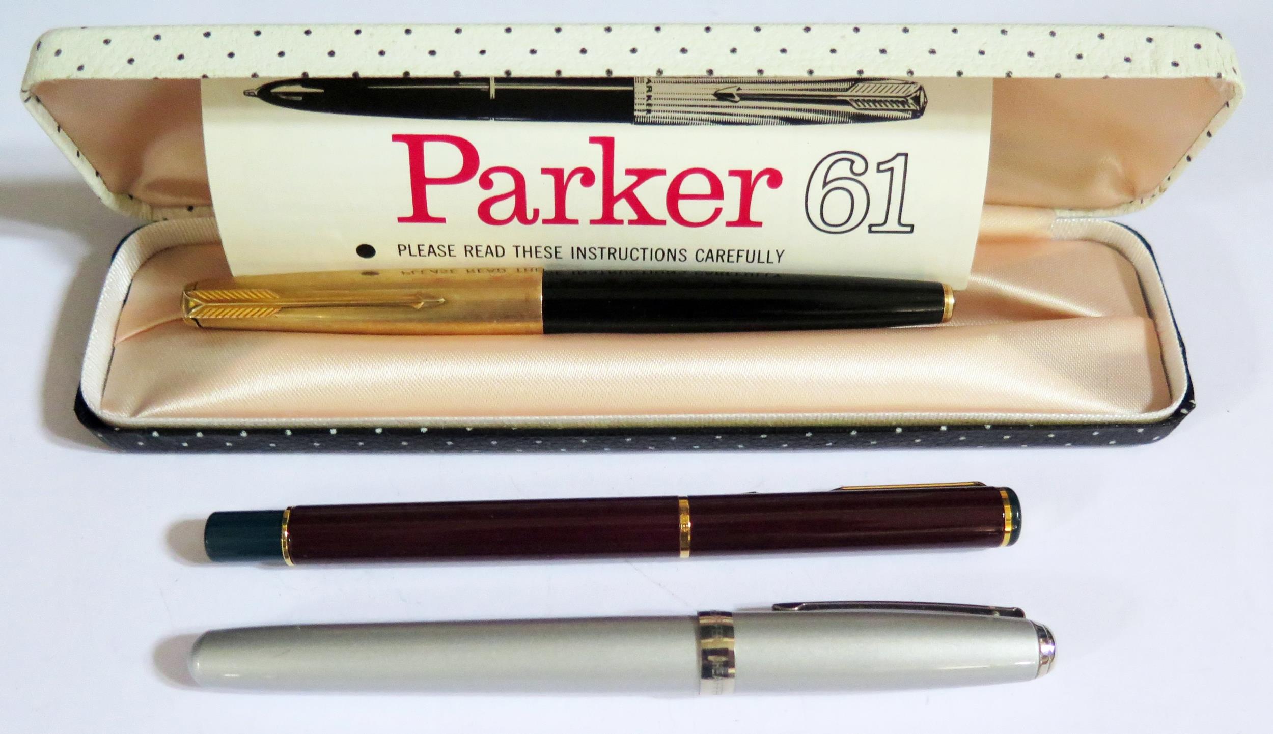 A Parker 61 Cased Fountain Pen with instructions, modern Parker and Sheaffer