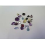 A Selection of Loose Gemstones including opals and amethyst