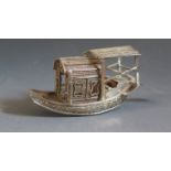 A Small Hong Kong Silver Boat 9cm long, signed to the stern, 27.7g