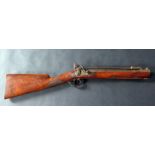 An Eighteenth Century Coachman's Flintlock Blunderbuss. Spring loaded Bayonet and lock plate engrav