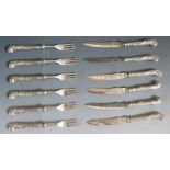 A Set of Six Sheffield Silver Handed Fruit Knives and Forks