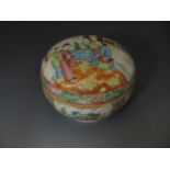 A 19th Century Chinese Famille Rose Box decorated with figures and flowers, 10.5cm diam.