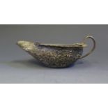 An Indian Silver Plated Sauce Boat with embossed foliate decoration and serpent handle, 14cm long,