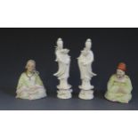 Two Chinese Blanc-de-Chine Guanyin Figures and Two Pottery Nodding Head Figures. Guanyin figures