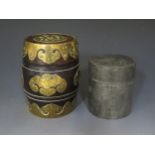 A Chinese Hardwood Barrel with Brass overlay decoration in the form of Bats. Height 14cm, Width