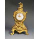 A Gilt Spelter Rococo Style Clock, 19cm. A/F