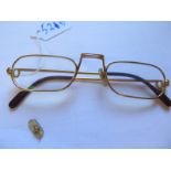 A Pair of Cartier Spectacles, one bridge piece broken but present