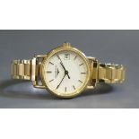 A Ladies LONGINES Gold Plated Wristwatch, running