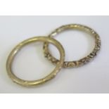 Two Early 19th Century Gold Jump Rings including one of a snake consuming its tail, c. 19mm diam.,