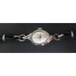 A Ladies TISSOT 14K White Gold and Diamond Wristwatch, with 17 jewel manual wind movement no.
