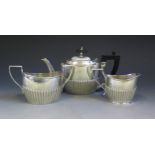 A Victorian Silver Bachelor's Three Part Tea Set with gadrooned decoration, 20.5x11.5cm, London 1894