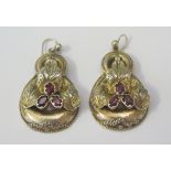 A Pair of Unmarked Silver Gilt and Garnet Pendant Earrings, c. 42mm drop, 15.1g