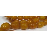 A Baltic Amber Bead Necklace, largest bead 29x26mm, 106.2g