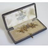 A Goldsmiths & Silversmiths Cased Unmarked Gold Floral Spray Brooch, 47mm, 2.8g