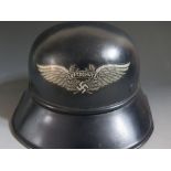 A German Third Reich LUFTSCHUTZ Helmet, inside rim stamped RL-2 40/14