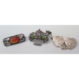 A Silver MIZPAH Brooch, silver and paste floral basket brooch and carnelian brooch, largest 34mm