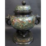 A 19th Century Chinese Bronze and Enamel Vase on circular Stand. Elephant Handles. 27cm tall.