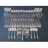An Elizabeth II Set of Silver Cutlery for Ten including large pistol grip knives, large three