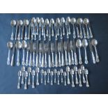 An Elizabeth II Silver Queens Pattern Set of Cutlery for Eight comprising large knives and forks,