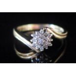 A 9ct Gold and Diamond Cluster Ring, size M.5, 3.3g