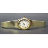 A Ladies Zenith 9ct Gold Quartz Wristwatch with box and sales card, 22.1g including watch