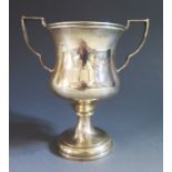 An Edward VII Silver Two Handled Presentation Cup, not engraved, London 1936, 16cm high,