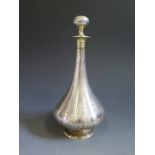 A French Silver and Gilt Highlighted Scent Bottle with engine turned and chased acanthus leaf