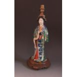 A Chinese Famille Vert Porcelain Female Figural Lamp holding a scroll, base of lamp with newspaper